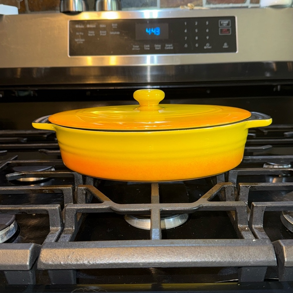 Parini gradient yellow non stick covered baking dish.